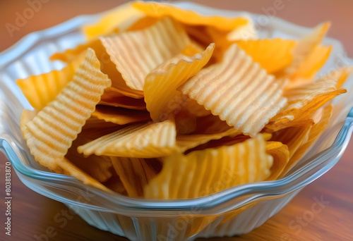 A close-up of a glass plate filled with corrugated chips