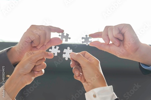 Businessman team work jigsaw. Business Concept.