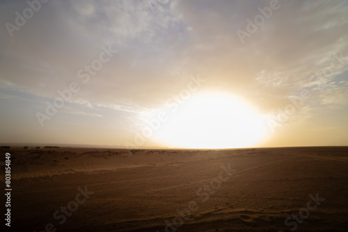 A sunrise of desert at Mhamid el Ghizlane in Morocco wide shot