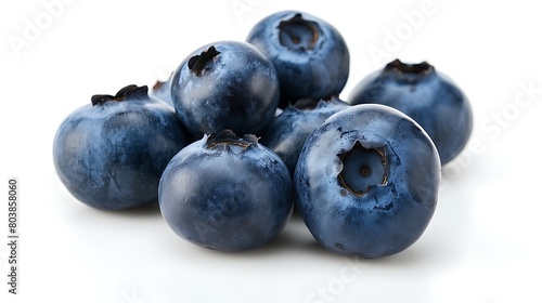 Plump blueberries clustered together on a pristine white background.