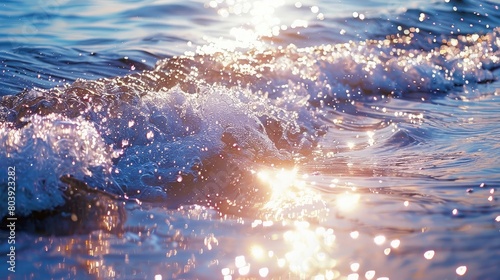 Glittering waves of sunlight on a calm ocean surface, symbolizing tranquility and natural beauty.