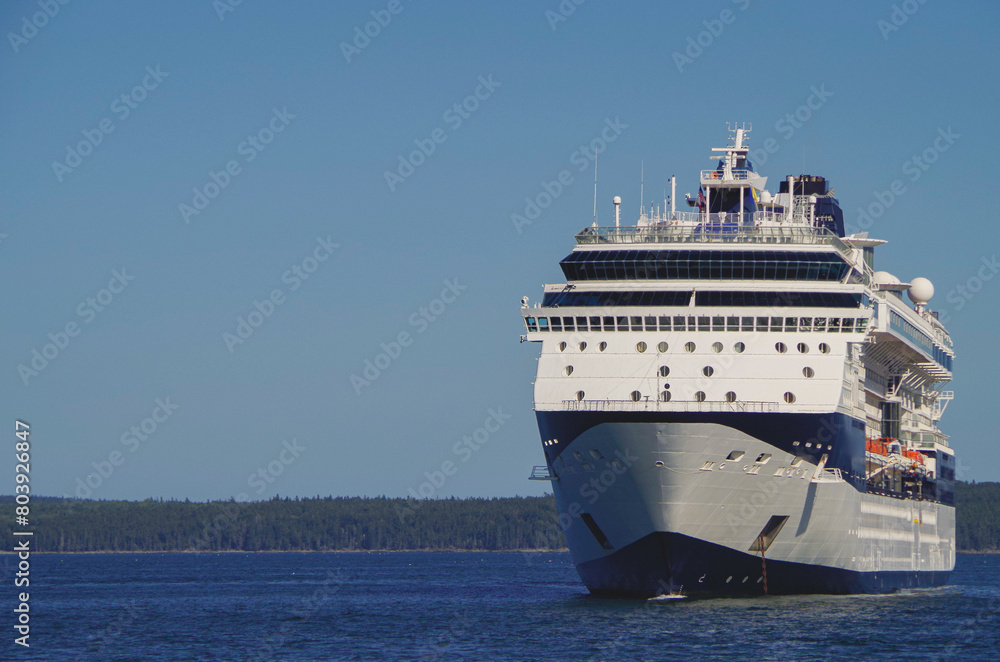 Modern cruiseship or cruise ship liner Summit in Bar Harbor Bay, Maine cruise port during New England Indian Summer cruising on family vacation