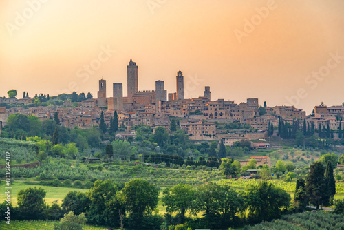 Medieval San Gimignano hill town with skyline of medieval towers  including the stone Torre Grossa. Province of Siena  Tuscany  Italy.