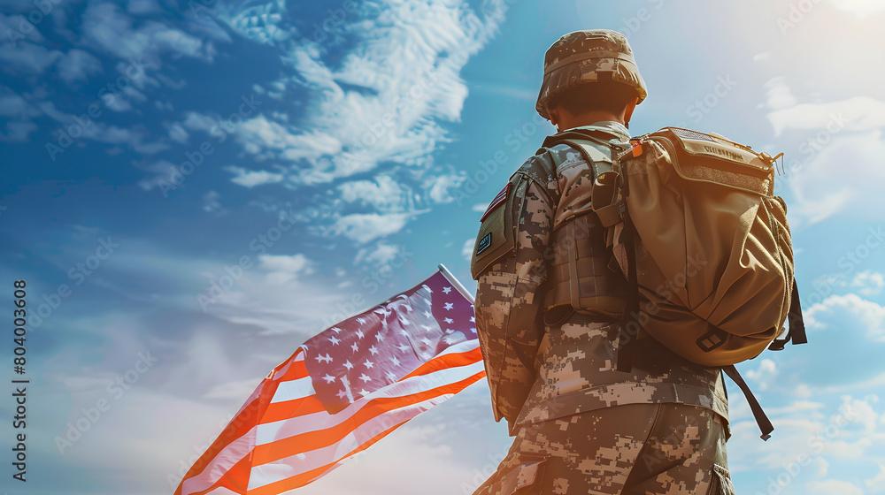 Dynamic image of an American soldier holding US flag with background of blue sky, Veteran Day. Dynamic image of an American soldier holding US flag with background of blue sky, Veteran Day.
