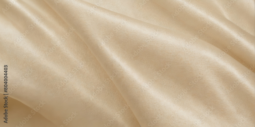 A light colored fabric with a pattern of waves. The fabric is smooth and silky. The waves are small and spaced out A light colored fabric with a pattern of waves. The fabric is smooth and silky. The waves are small and spaced out