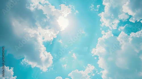 Commercial airplane flying through a cloudy blue sky, suitable for travel or transportation concepts