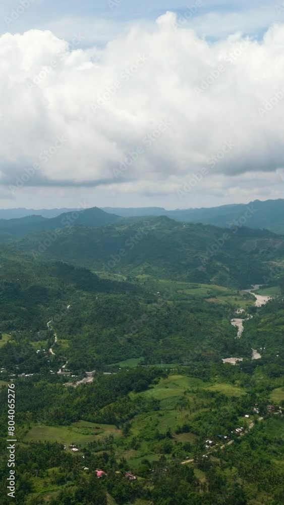 Aerial drone of farmland and mountains with green forest. Negros, Philippines. Aerial drone of farmland and mountains with green forest. Negros, Philippines.
