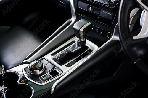 automatic transmission shift selector in the car interior. Closeup a manual shift of modern car gear shifter. 4x4 gear shift	