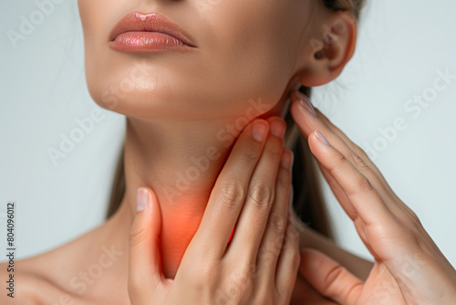 Close-up of a girl holding her neck  which may symbolize feelings of pain  discomfort or illness. This image can be interpreted as a metaphor for physical or emotional discomfort.