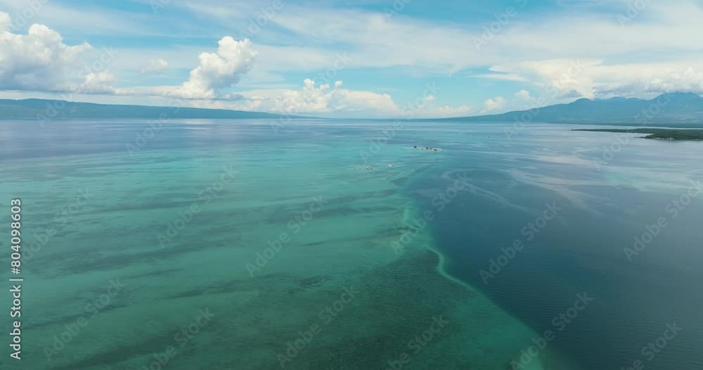 Manjuyod sandbar in the turquoise water of the sea on the atoll. Negros, Philippines. Manjuyod sandbar in the turquoise water of the sea on the atoll. Negros, Philippines.