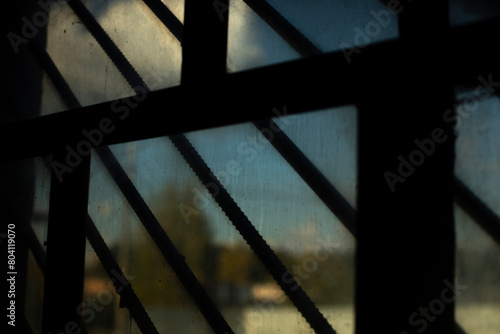 Grille on window. Steel bars across window. Interior details. photo
