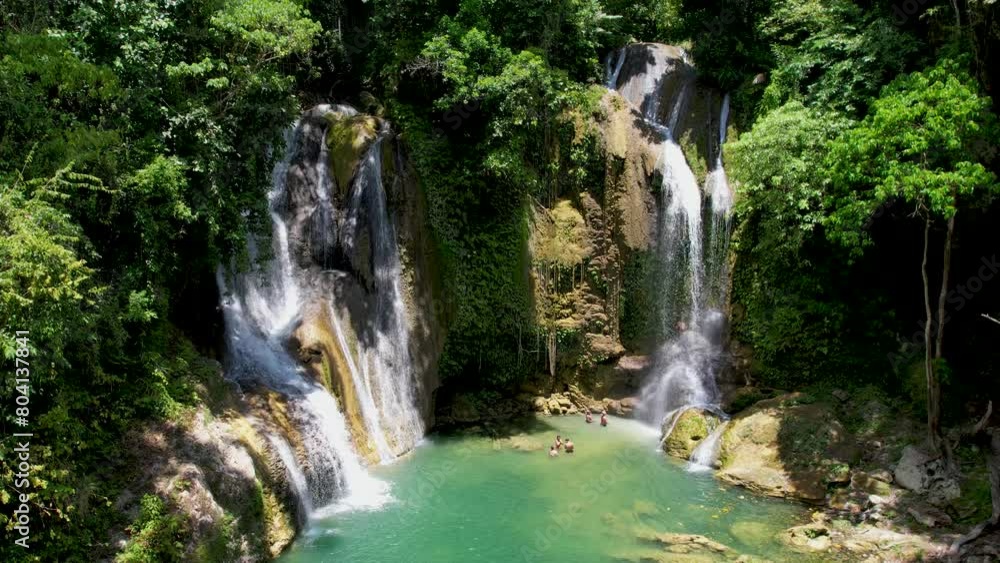 4K Aerial Drone video of wonderful cascading Twin Falls with emerald water in lush green jungle on a sunny day in Bohol, Philippines. Pahangog waterfalls 4K Aerial Drone video of wonderful cascading Twin Falls with emerald water in lush green jungle on a sunny day in Bohol, Philippines. Pahangog waterfalls