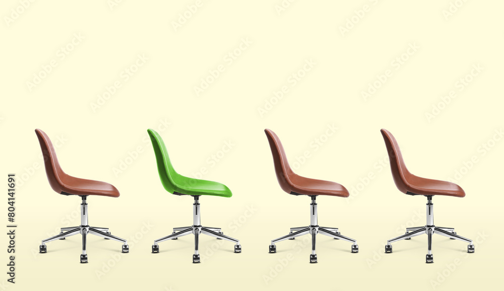 Vacant position. Green office chair among brown ones on beige background, banner design Vacant position. Green office chair among brown ones on beige background, banner design