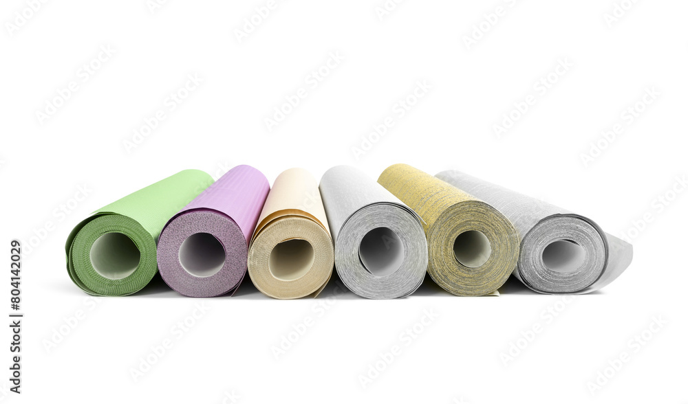 Different colorful wallpaper rolls isolated on white Different colorful wallpaper rolls isolated on white
