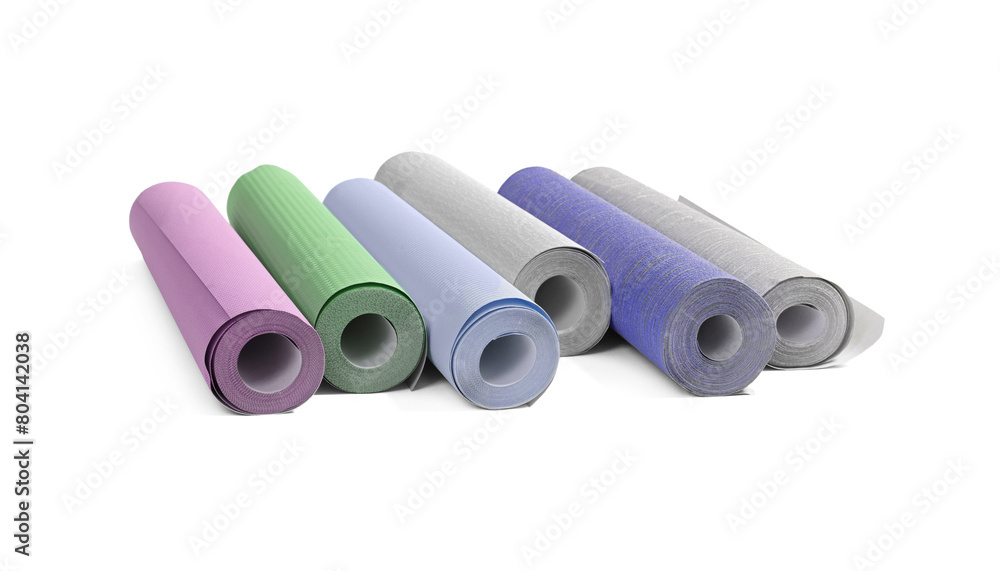 Fototapeta premium Different colorful wallpaper rolls isolated on white