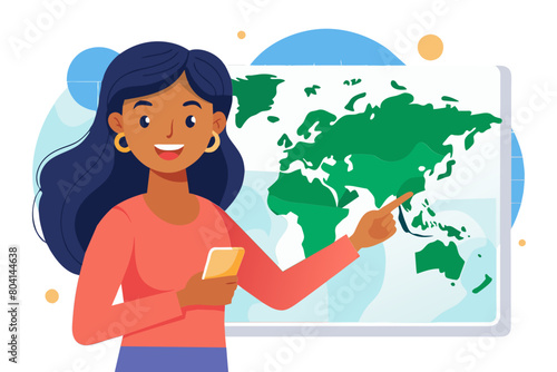 Happy young Indian woman pointing finger at world geography map on wall looking at camera for portrait with toothy smile planning travel vacation enjoying future foreign trip modern flat design simple