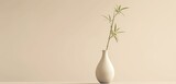 A minimalist depiction of a single, slender vase containing a bamboo stalk, set against a pure, ivory background, embodying the Zen principles of simplicity, nature.