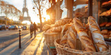 Freshly baked gourmet breads for sale in French bakery. Baguettes on early sunny morning in small town in France.