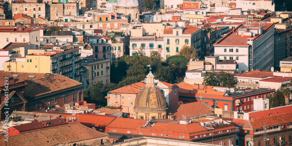 Naples, Italy. Top View Cityscape Skyline With Famous Landmarks In Sunny Day. Many Old Churches And Temples.