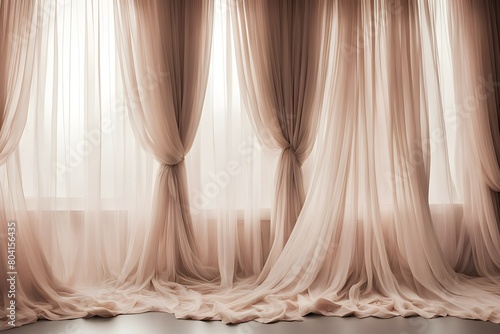 The curtains are white and flow in the wind photo