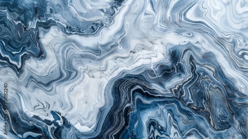 Swirling marble patterns in shades of gray and blue create a sophisticated texture.