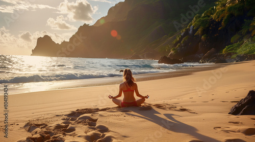 Morning Yoga by the Ocean: A woman practices morning yoga on a sandy beach by the sea. The sun is just rising, casting its rays upon the beach