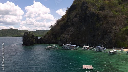 Panning left to right to reveal Cudugnon Beach in El Nido, Philippines. photo