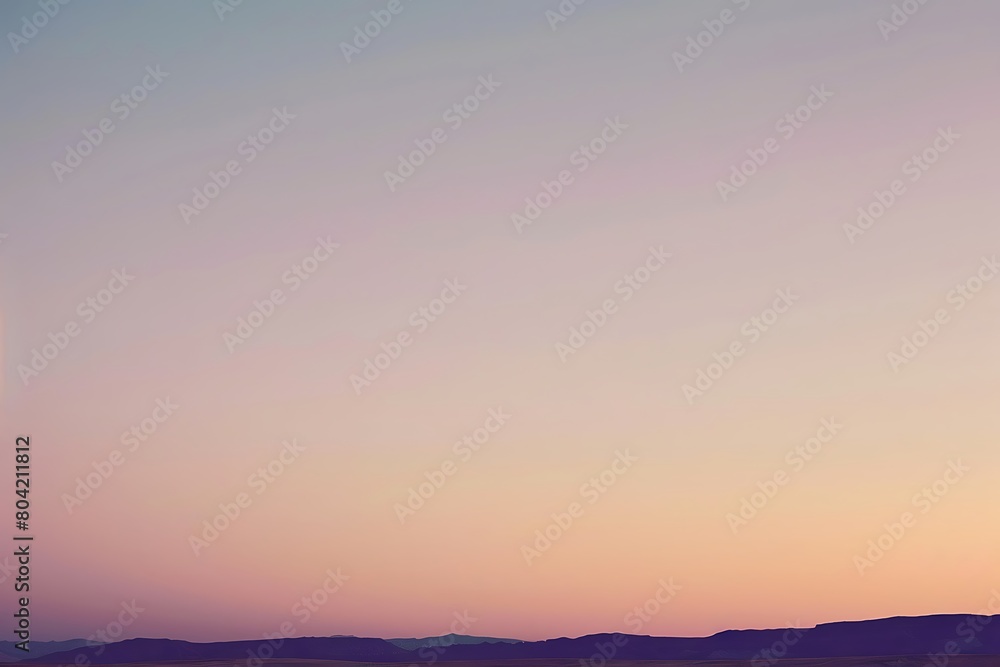 The smooth gradient of a desert sky at twilight