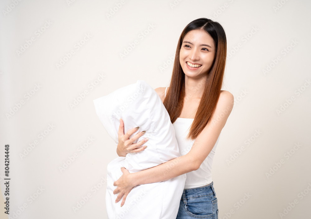 Young beautiful asian woman sleeping hugging soft pillow. Cute smiling Drowsy female on isolated white background. Young beautiful asian woman sleeping hugging soft pillow. Cute smiling Drowsy female on isolated white background.