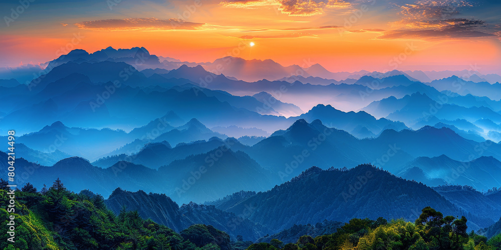  beautiful mountains layered with blue and green colors, a valley  misty clouds over mountains, mountains landscape at sunset or sunrise, nature background