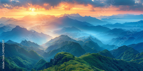  beautiful mountains layered with blue and green colors  a valley  misty clouds over mountains  mountains landscape at sunset or sunrise  nature background