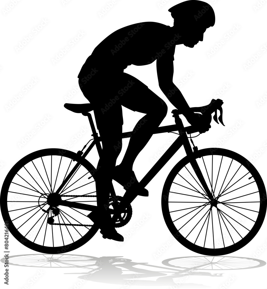 Bicyclist riding their bike and wearing a safety helmet in silhouette Bicyclist riding their bike and wearing a safety helmet in silhouette