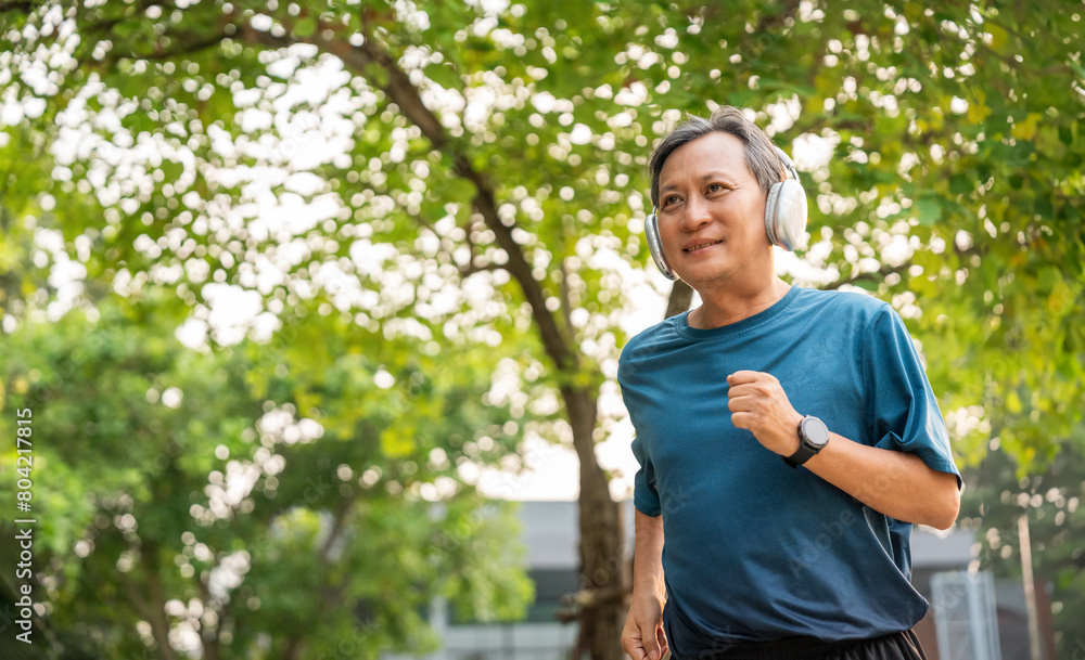 Senior old man runner exercise outdoor nature park. fitness man jogging wearing sportswear. Mature athlete man in sportswear Workout running at public park. Health and activity old man lifestyle Senior old man runner exercise outdoor nature park. fitness man jogging wearing sportswear. Mature athlete man in sportswear Workout running at public park. Health and activity old man lifestyle