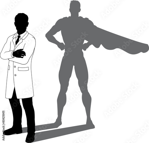 A superhero male scientist, engineer, doctor or teacher in a lab white coat man. Revealed by his shadow silhouette as a super hero in a cape.