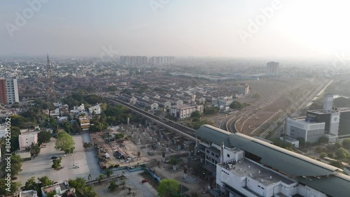 A cinematic drone shot of Chennai, capturing the city's energetic vibe and architectural beauty. photo