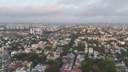 An expansive drone footage capturing the expanse of Chennai's urban landscape, from the busy city center to the tranquil suburban neighborhoods. photo