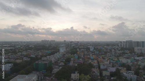 Wallpaper Mural An immersive aerial perspective of Chennai's urban landscape, showcasing the bustling city life and architectural diversity amidst a cloudy sky. Torontodigital.ca