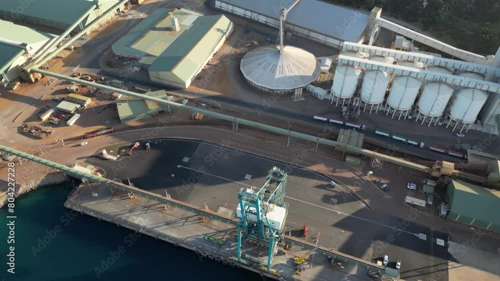 Port area for grain industry storage, Esperance in Western Australia. Aerial top-down orbiting Port area for grain industry storage, Esperance in Western Australia. Aerial top-down orbiting
