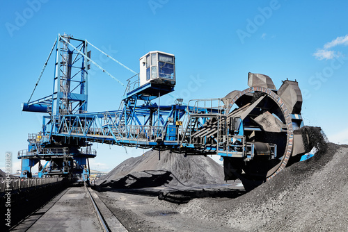 Canvas Print Bucket wheel boom reclaimer dealing with heavy bulk materials in coal stockyard