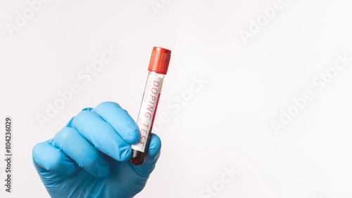 Doping Test of Olympic Games Athletes. Test tube with doping test of athlete's blood on white background. The concept of doping by athletes to prepare for the Olympic Games. photo