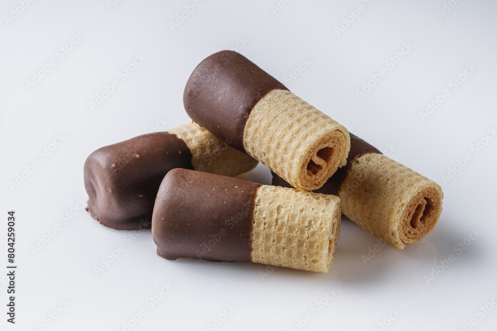 crispy dessert wafer rolls on a white background crispy dessert wafer rolls on a white background