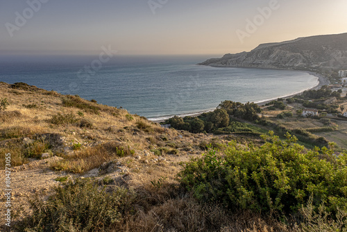 View of Pissouri Bay at early sunset towards the east as seen from its eastern hilltop, Pissouri Village, Limassol, Cyprus 