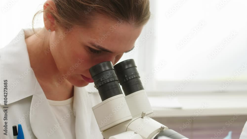 A female patient has a consultation with her gynecologist in a medical clinic. Women's health, colposcopy, examination of the uterus and ovaries. A female patient has a consultation with her gynecologist in a medical clinic. Women's health, colposcopy, examination of the uterus and ovaries.