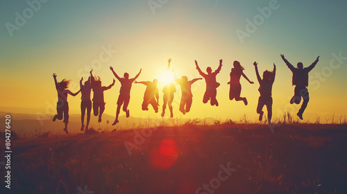 Silhouette of group of people jumping in the air in front of bright sunrise in mountain, Bright Sunrise in the Mountain Background, Outdoor Activity with Friends at Sunrise, Excited People Jumping