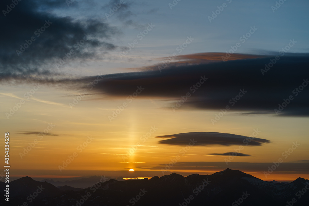 Sunrise at the summit of the mountain Sunrise at the summit of the mountain