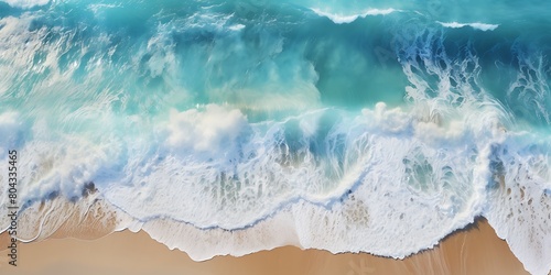 Aerial view of blue ocean wave on sandy beach. Top view