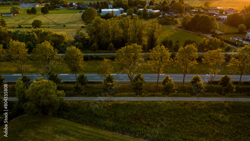 Road in East Flanders. Aerial view at sunset photo