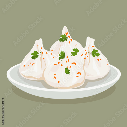 A plate of Manti Turkish dumplings with parsley on top