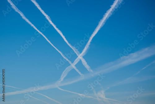 Photography Airplane contrails in the sky