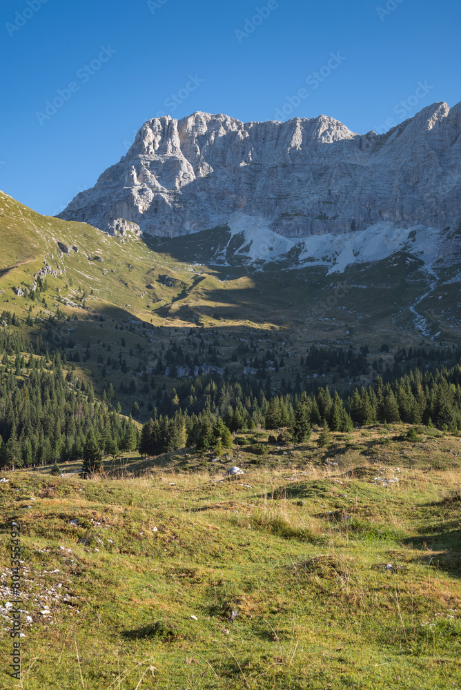 Obraz premium Mountain landscape Pecol in Italy, monumental gorges and its surroundings on a summer day. Travel, nature, and tourism concepts.